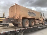 Used Water Truck in yard